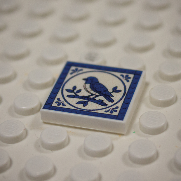Printed Part - 2X2 Tile - Bird with blue border