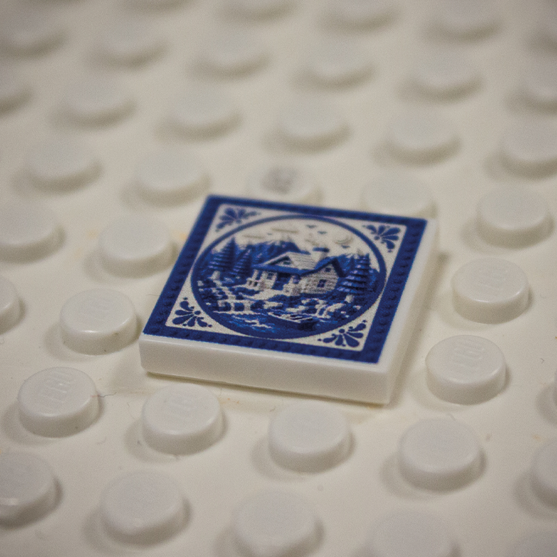 Printed Part - 2X2 Tile - Ski hut with blue border