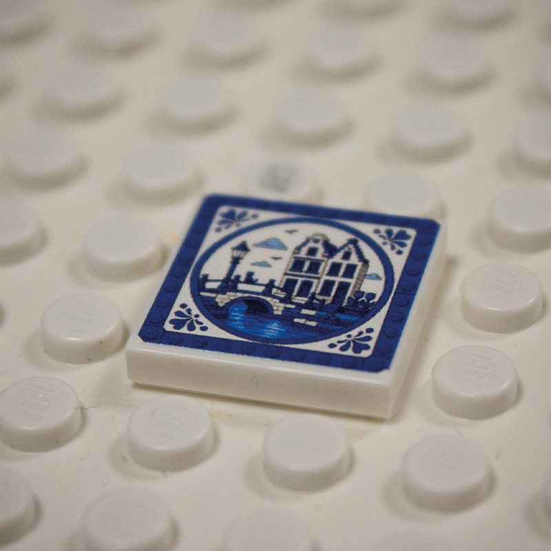 Printed Part - 2X2 Tile - Canal house with Blue Border